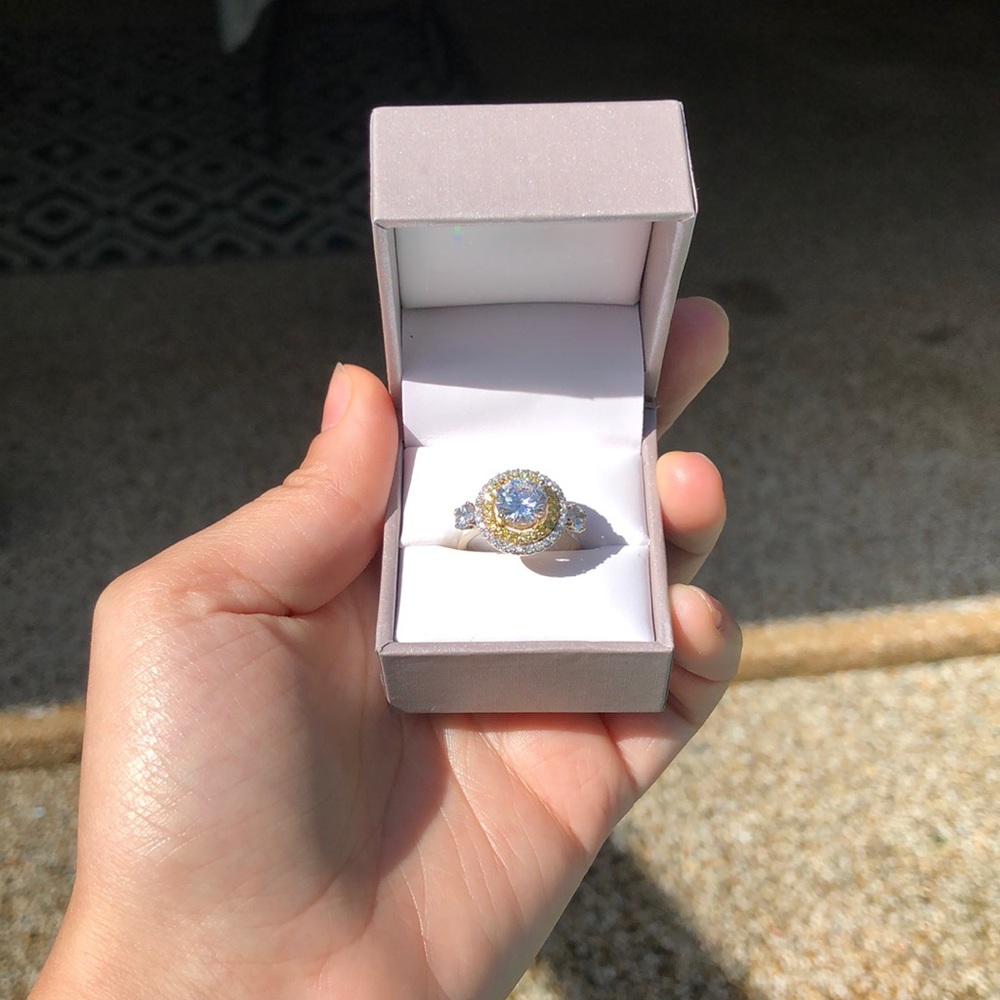 Masonite and white diamond and canary diamond ring set in 14kG white and yellow.